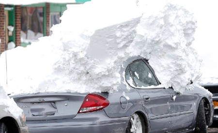 car buried in lake effect snow