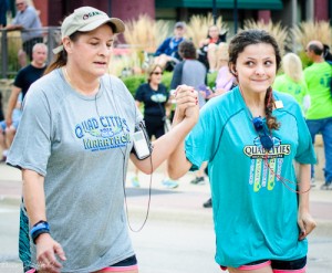 Mom and Daughter Crossing Finish Line at Marathon